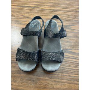 Dansko woman’s black shimmery Velcro closure sandals